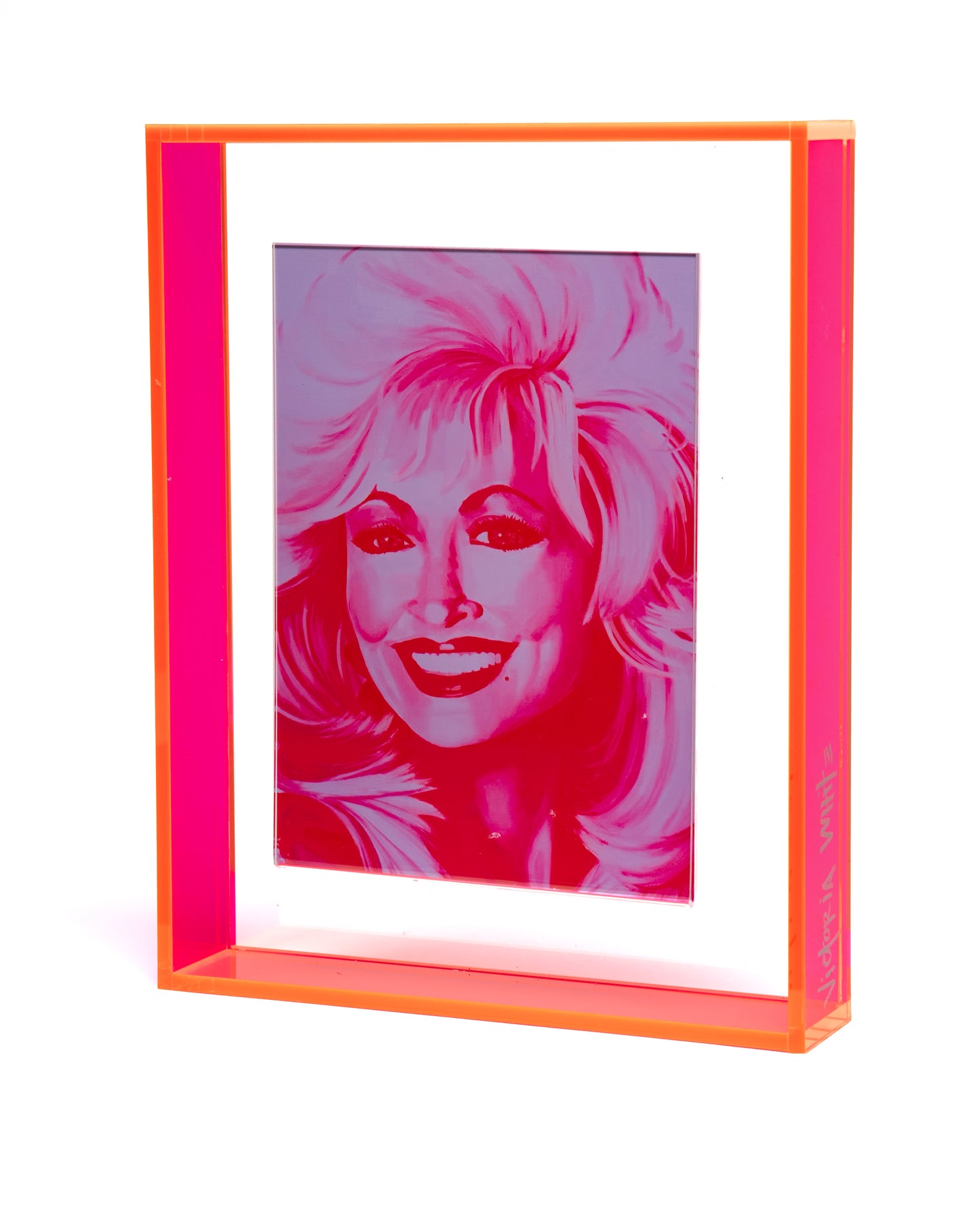 dolly parton print in neon pink floating acrylic frame