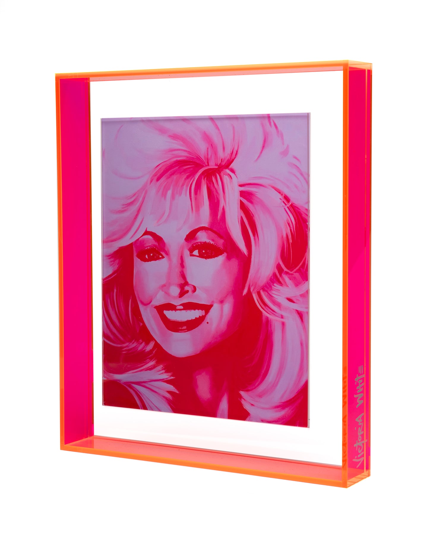 dolly parton print in neon pink floating acrylic frame