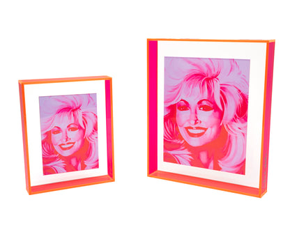 dolly parton print in neon pink floating acrylic frame